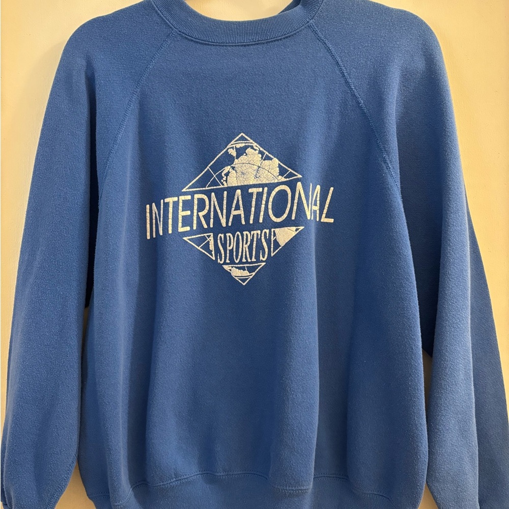 Blue Crewneck Sweatshirt with International Graphic